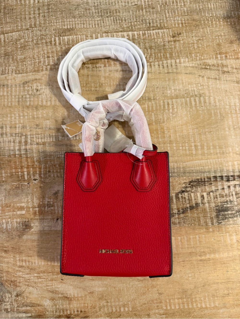 Red Michael Kors crossbody purse. NWT